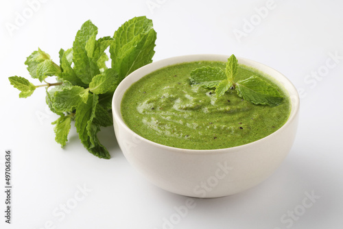 Green Mint Chutney or Pudina Chutney made with Coriander, Pudina & Spices. selective focus