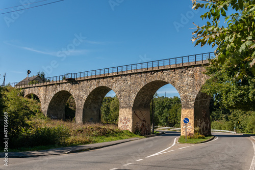 A big, old, ancient aqueduct bridge in the mountains