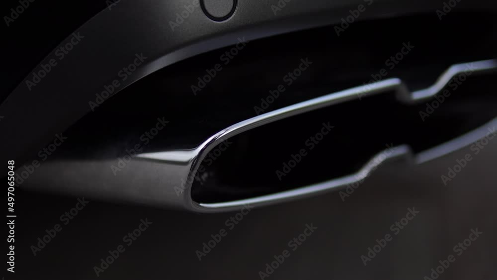 The car chrome exhaust pipe close-up. The car chrome exhaust pipe close-up.