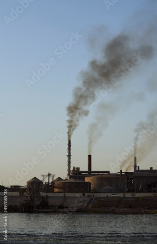 Smoke and Pollution from a Riverside Factory
