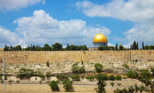 The photo shows the iconic golden Dome of the Rock in Jerusalem, Israel, with intricate designs and patterns adorning its shimmering surface.