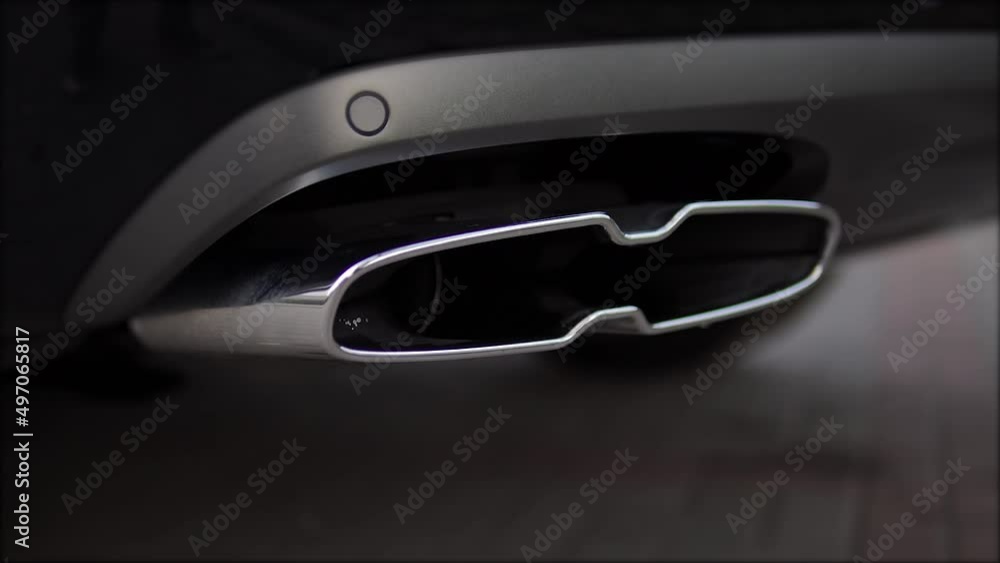 The car chrome exhaust pipe close-up. The car chrome exhaust pipe close-up.