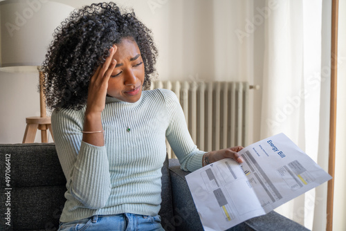 Photo One shocked black woman worried about home energy expenses