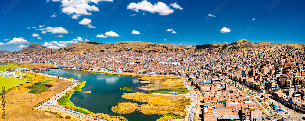 Obraz premium Aerial panorama of Puno with Lake Titicaca in Peru, South America