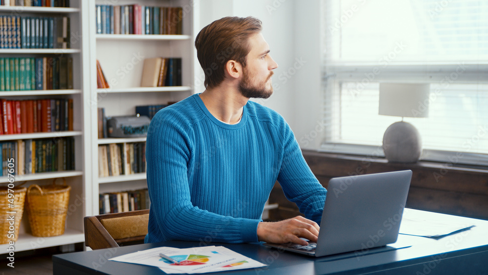 Thinking young man sitting at home Thinking young man sitting at home