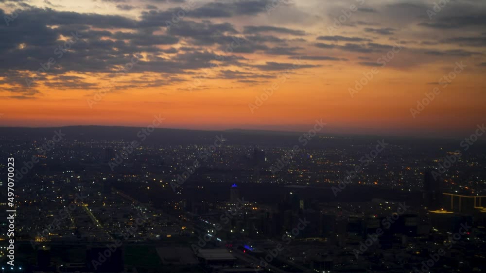 Flying over the city of Erbil, Kurdistan Iraq during a golden dawn Flying over the city of Erbil, Kurdistan Iraq during a golden dawn