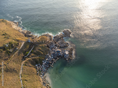 Fishing village by the sea, Arraial do Cabo, Rio de Janeiro, Brazil. drone aerial view photo