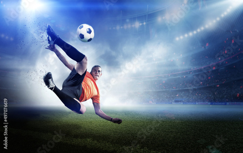 Football player kicks the ball, 3d rendering © efks