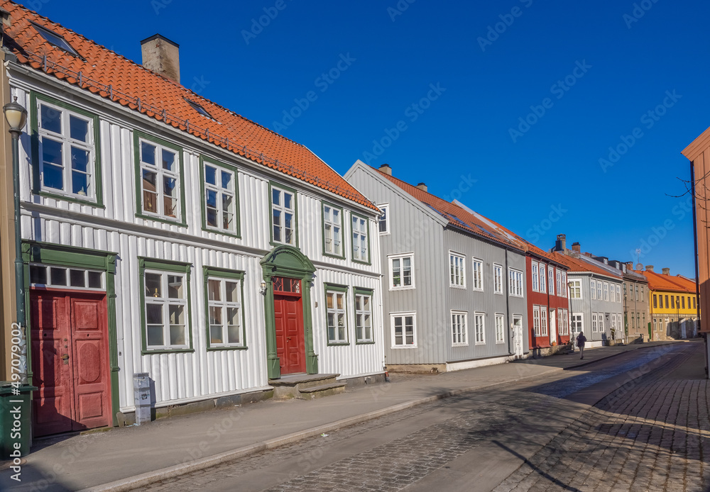 The streets behind the ancient warehouses flanking both sides of the Nidelva river in the old town of Trondheim, Trøndelag, Norway