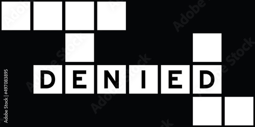 Alphabet letter in word denied on crossword puzzle background