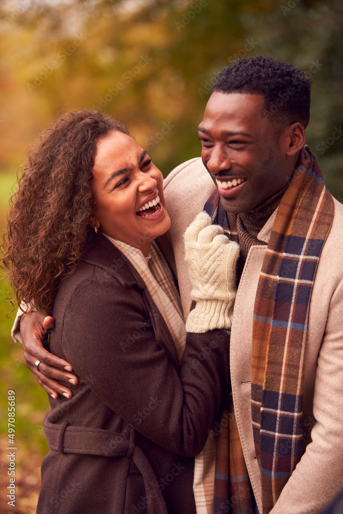Portrait Of Loving Couple On Walk Through Autumn Countryside Together Portrait Of Loving Couple On Walk Through Autumn Countryside Together