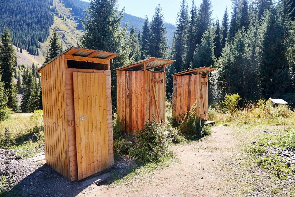 outdoor wooden toilets in the mountains in the tourist area outdoor wooden toilets in the mountains in the tourist area