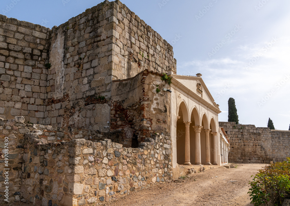 inner courtyard view of buildings and wall of the Merida fortress inm Extremadura