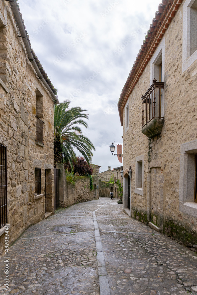cobblestone street leading into the picturesque old city center of Trujillo