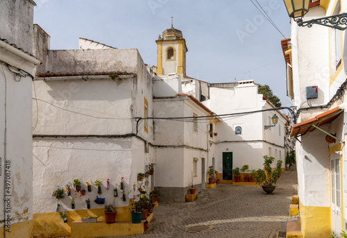 view of the historic city center of Elvas with its colorful whitewashed neighborhoods © makasana photo