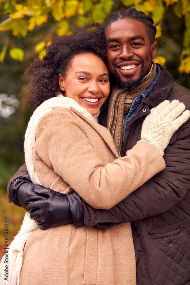 Portrait Of Loving Couple On Walk Through Autumn Countryside Together Portrait Of Loving Couple On Walk Through Autumn Countryside Together