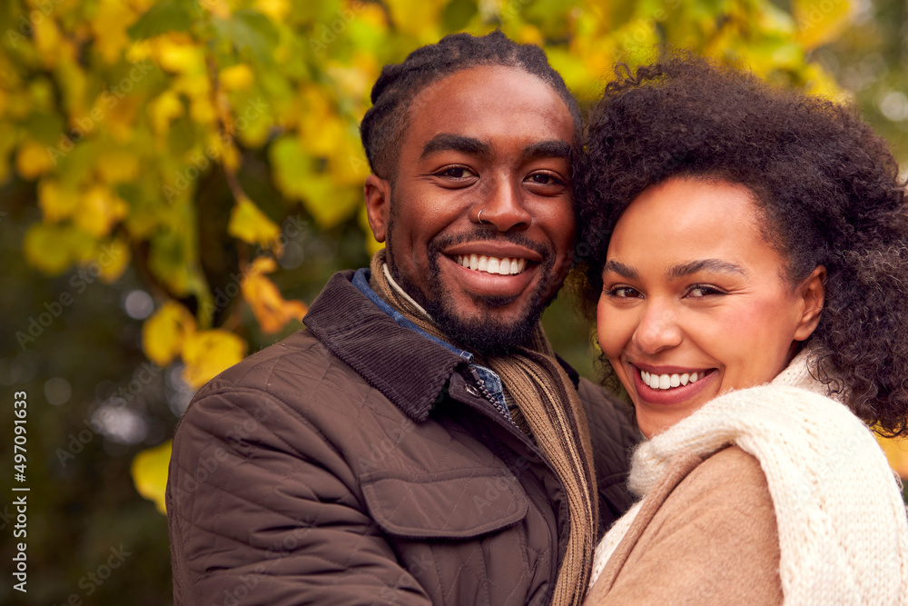 Portrait Of Loving Couple On Walk Through Autumn Countryside Together Portrait Of Loving Couple On Walk Through Autumn Countryside Together
