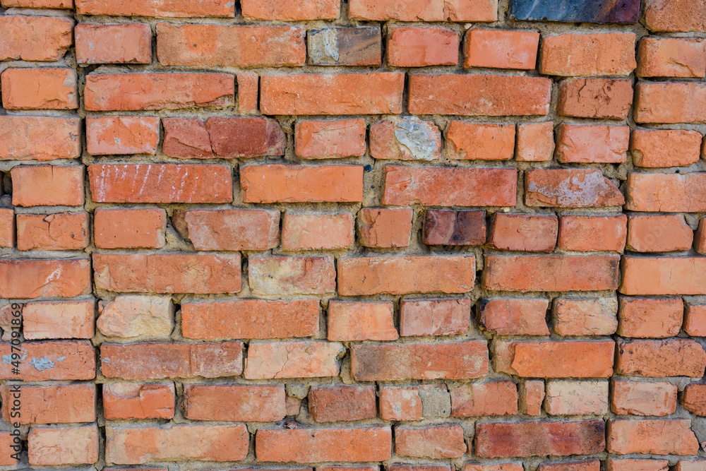 Red brick wall texture grunge background with vignetted corners to interior design Red brick wall texture grunge background with vignetted corners to interior design