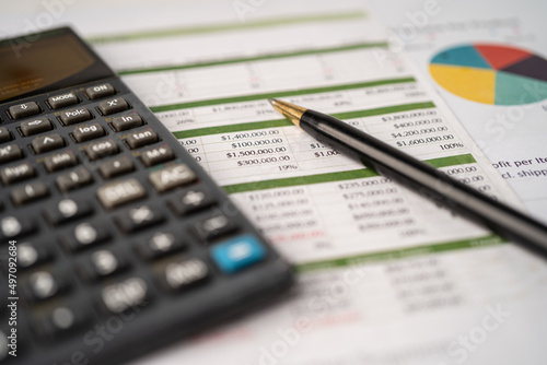 Calculator on spreadsheet paper. Finance development, Banking Account, Statistics, Investment Analytic research data economy, Stock exchange trading, Business company concept.