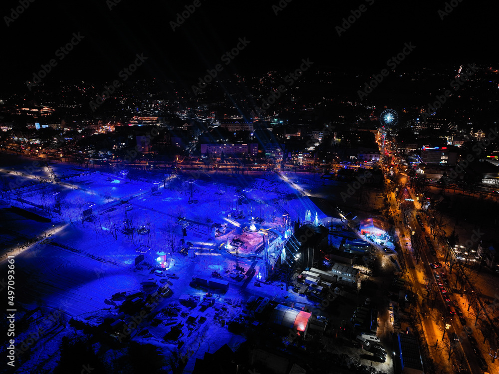 Aerial night view of New Year's Eve preparations in the city of Zakopane in Poland