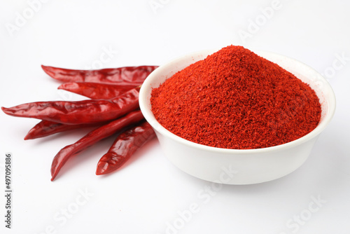 Fototapeta Naklejka Na Ścianę i Meble -  Indian spice Red chilli powder in white ceramic bowl