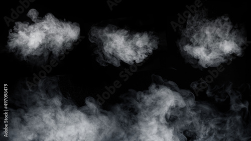 A set of different types of swirling, writhing smoke, steam isolated on a black background for overlaying on your photos