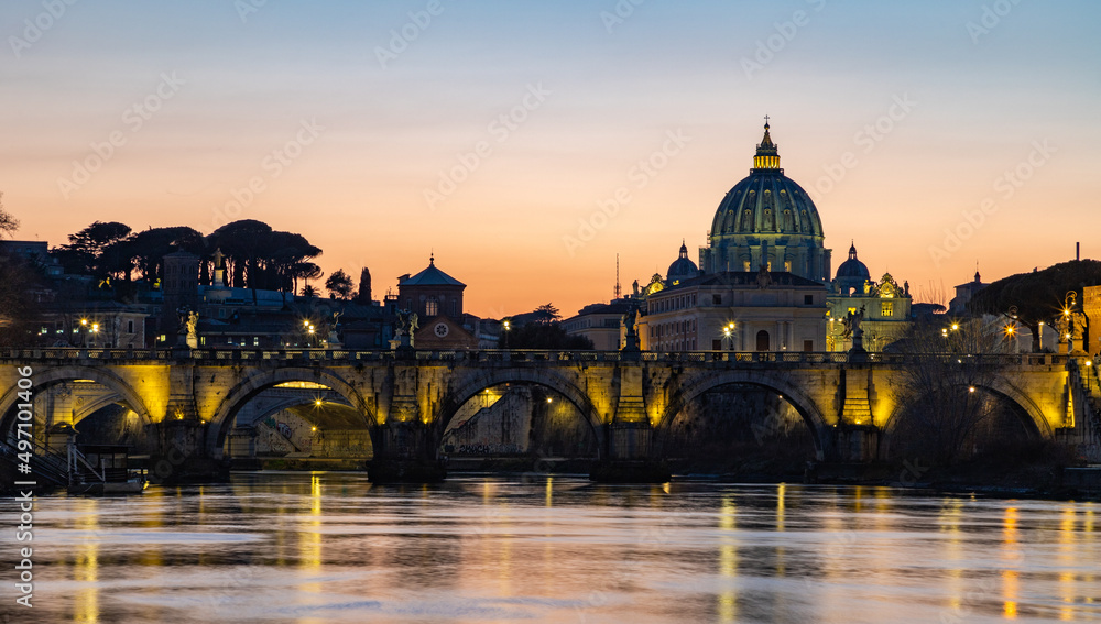 Fototapeta premium St. Angelo Bridge and St. Peter's Basilica at Sunset
