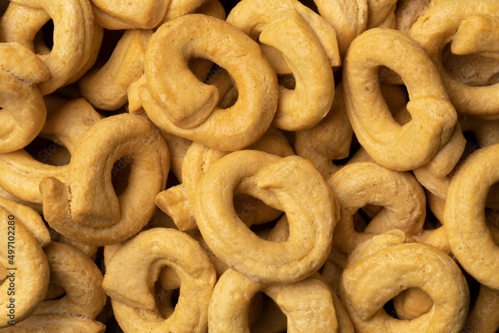 Fresh traditional Italian Tarallini full frame close up as background Fresh traditional Italian Tarallini full frame close up as background