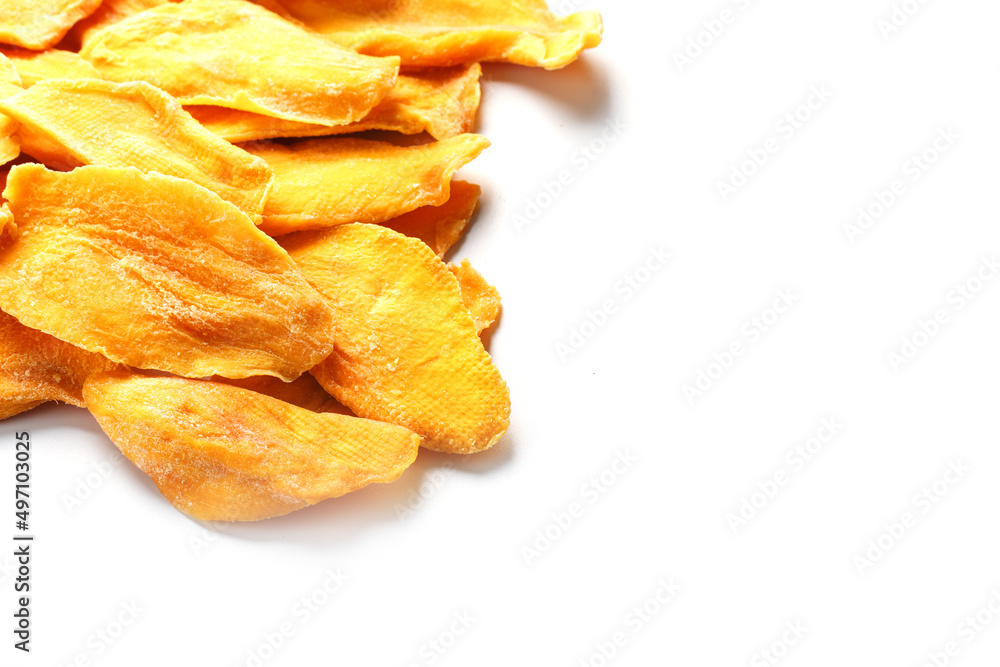 Dried mango sliced on a white background with free space Dried mango sliced on a white background with free space