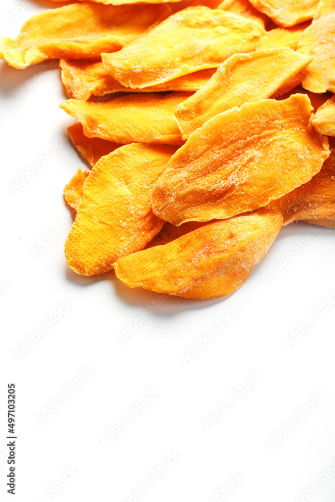 Dried mango sliced on a white background with free space