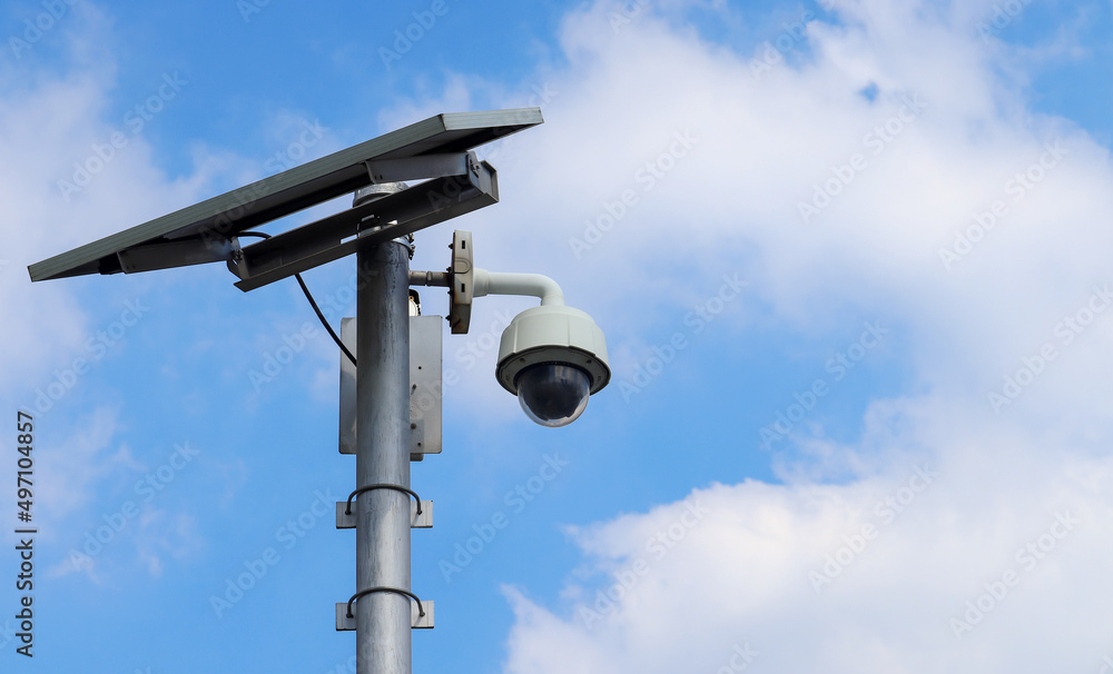 CCTV camera on bright blue sky background, Concept. 24 hour day and night security CCTV camera on bright blue sky background, Concept. 24 hour day and night security