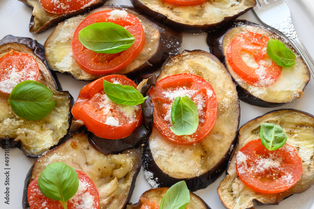 Baked eggplant with tomato, cheese and basil Baked eggplant with tomato, cheese and basil