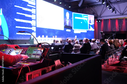 Fotografija Technician handling the lights at a conference