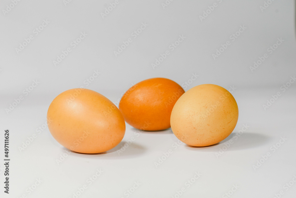 eggs isolated on a cutting board white background ,several eggs. eggs isolated on a cutting board white background ,several eggs.