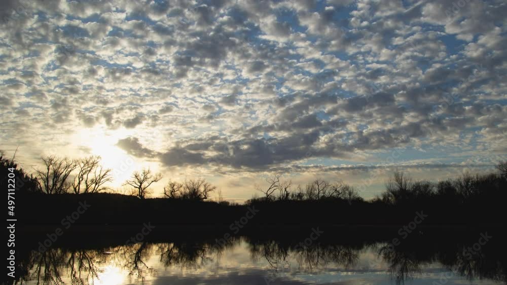 Brilliant Sunrise Clouds over Lake Zoom Out Timelapse Brilliant Sunrise Clouds over Lake Zoom Out Timelapse