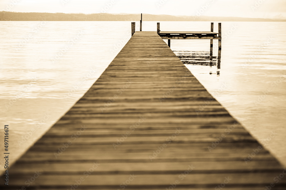 old wooden jetty at a lake old wooden jetty at a lake
