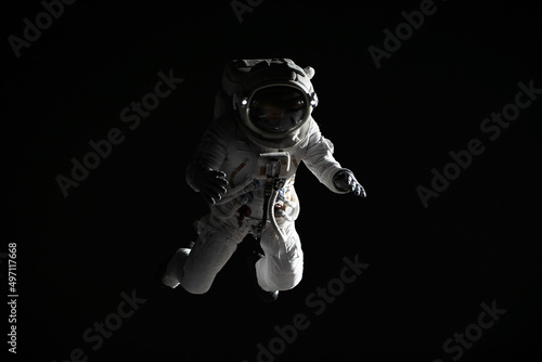Photo Full portrait of Caucasian female astronaut during spacewalk, black deep space b