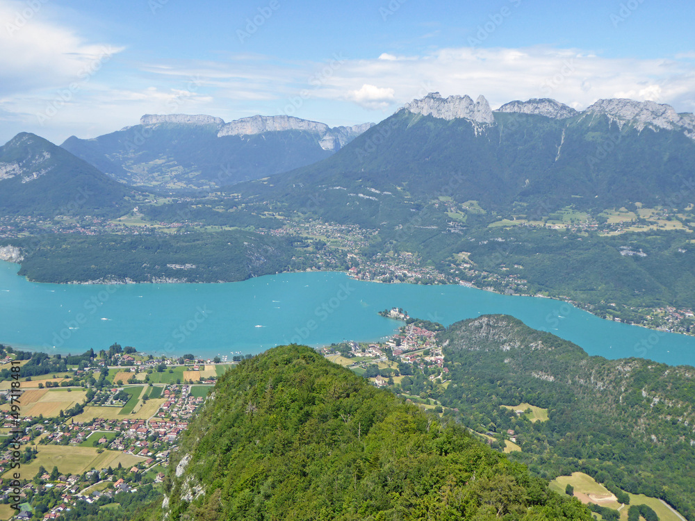 Paragliding above Lake Annecy in the French Alps	