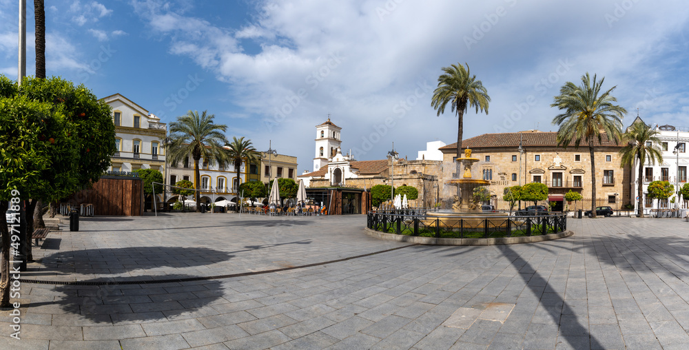 panorama view of the Plaza de Espana Square in the city center of Merida with its fountain and palm trees