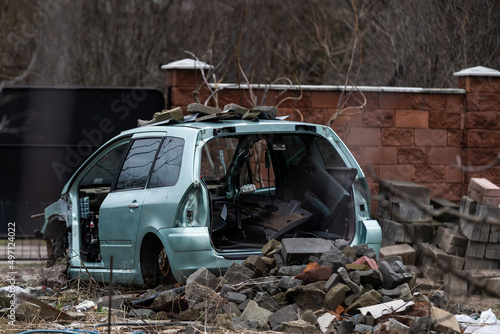 Photos Heap of old rusty disassembled car parts at workshop waste storage hangar indoor