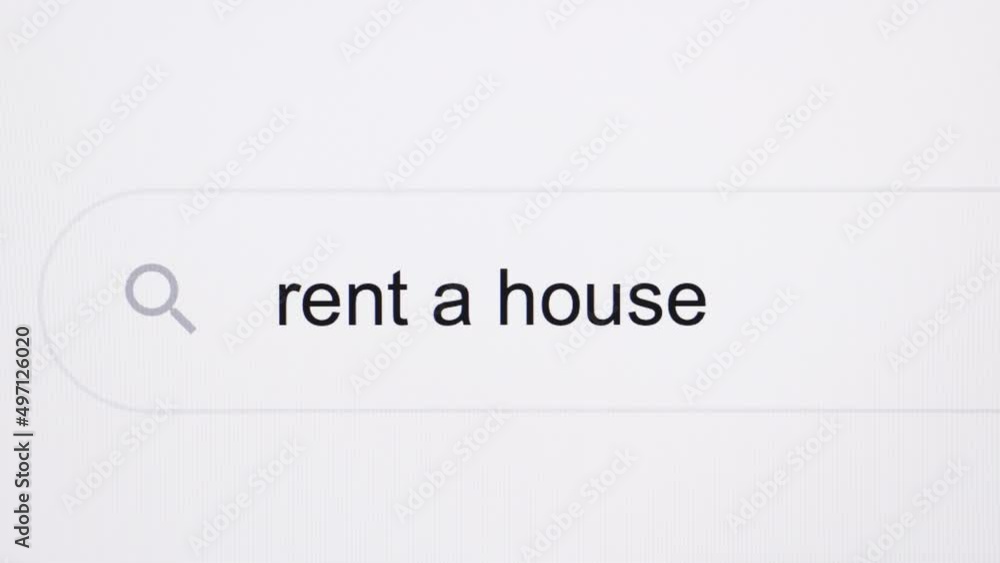 Rent a house - Internet browser search bar typing destination text with camera movement. Typing the word Rent a house in the browser on a computer screen Rent a house - Internet browser search bar typing destination text with camera movement. Typing the word Rent a house in the browser on a computer screen