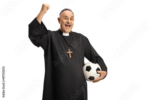 Happy priest football supporter holding a ball and cheering photo