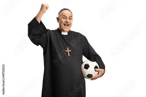 Fotografia Happy priest football supporter holding a ball and cheering