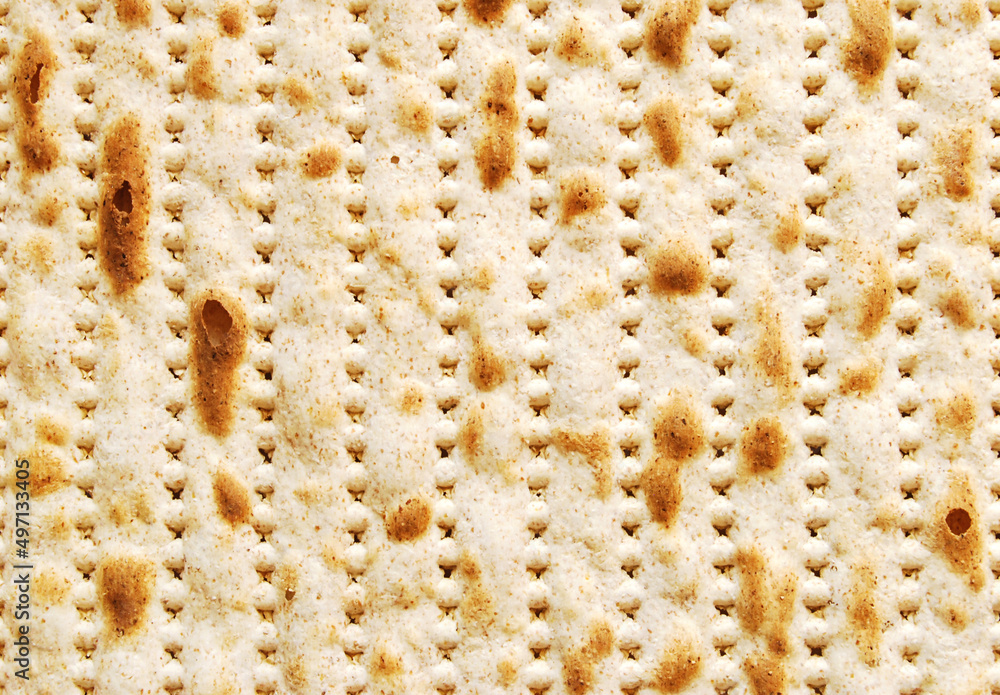 Matzo texture, a texture of a piece of traditional wheat dry bread served on Hebrew Passover Matzo texture, a texture of a piece of traditional wheat dry bread served on Hebrew Passover