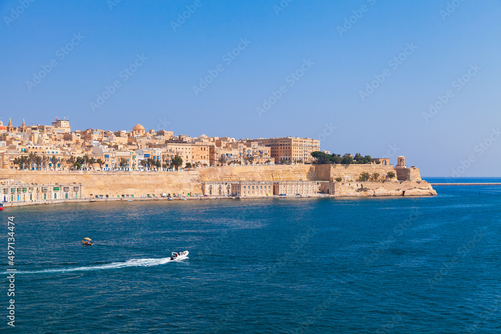 Valletta, Malta. Coastal view with motorboat