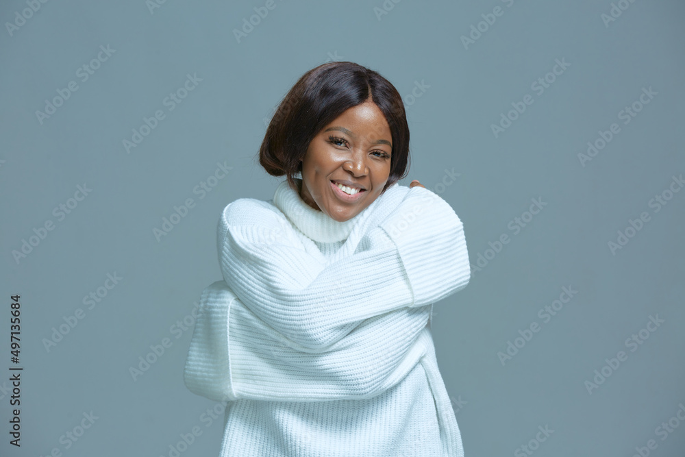 Happy positive african american young girl embrace herself feel self love, smiling. Body acceptance, good self esteem Happy positive african american young girl embrace herself feel self love, smiling. Body acceptance, good self esteem