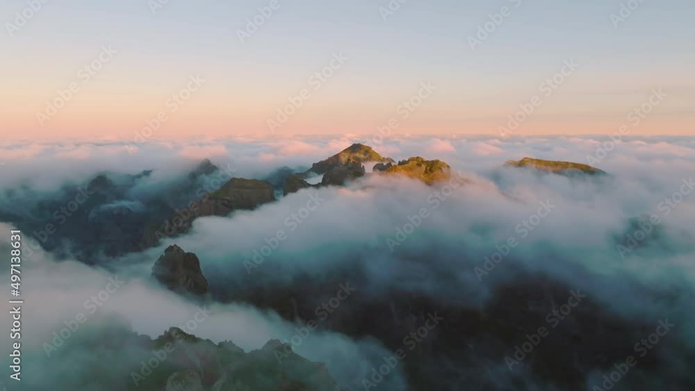 Top view of the third mountain on Madeira isalnd. Drone flight of the moutains in the morning light. Foggy morning on Madeira. Madeira, Portugal Top view of the third mountain on Madeira isalnd. Drone flight of the moutains in the morning light. Foggy morning on Madeira. Madeira, Portugal