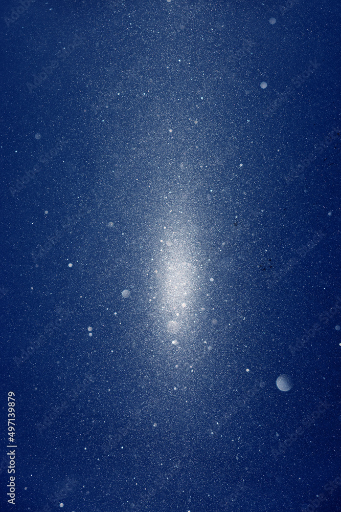 Snow and stars are falling on the background of blue luminous rays Snow and stars are falling on the background of blue luminous rays