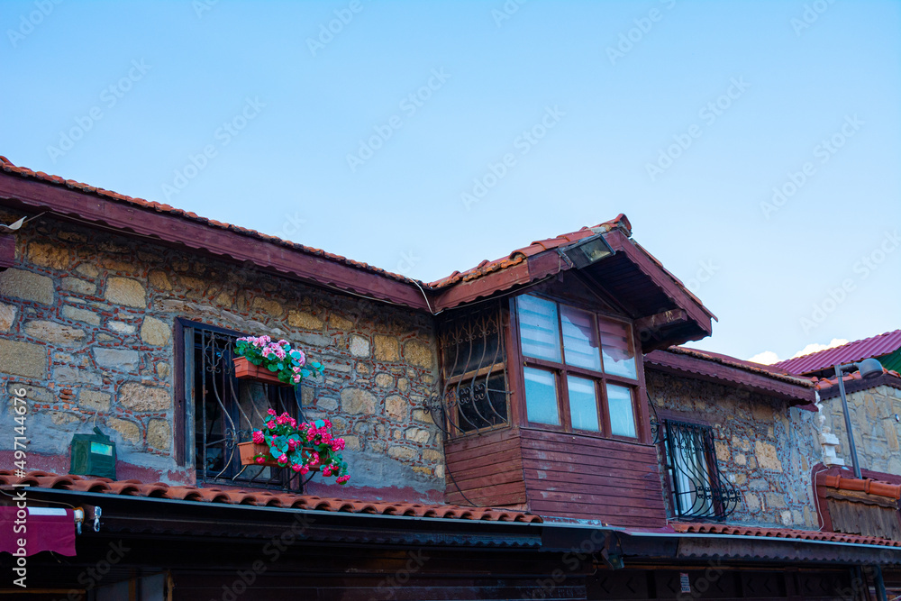 Beautiful window of a vintage house in the old town of Side