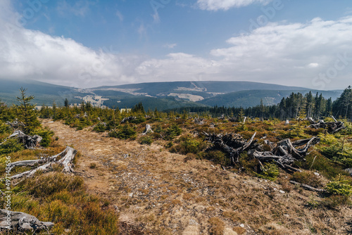 Krkonose National Park in spring. Mountain landscape of Giant moutains, Bohemia. Mountain meadows, peaks and forest of Krkonose mountains, Czechia.
